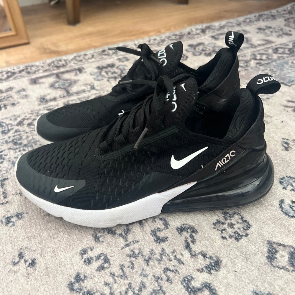 Black and white Nike athletic sneakers